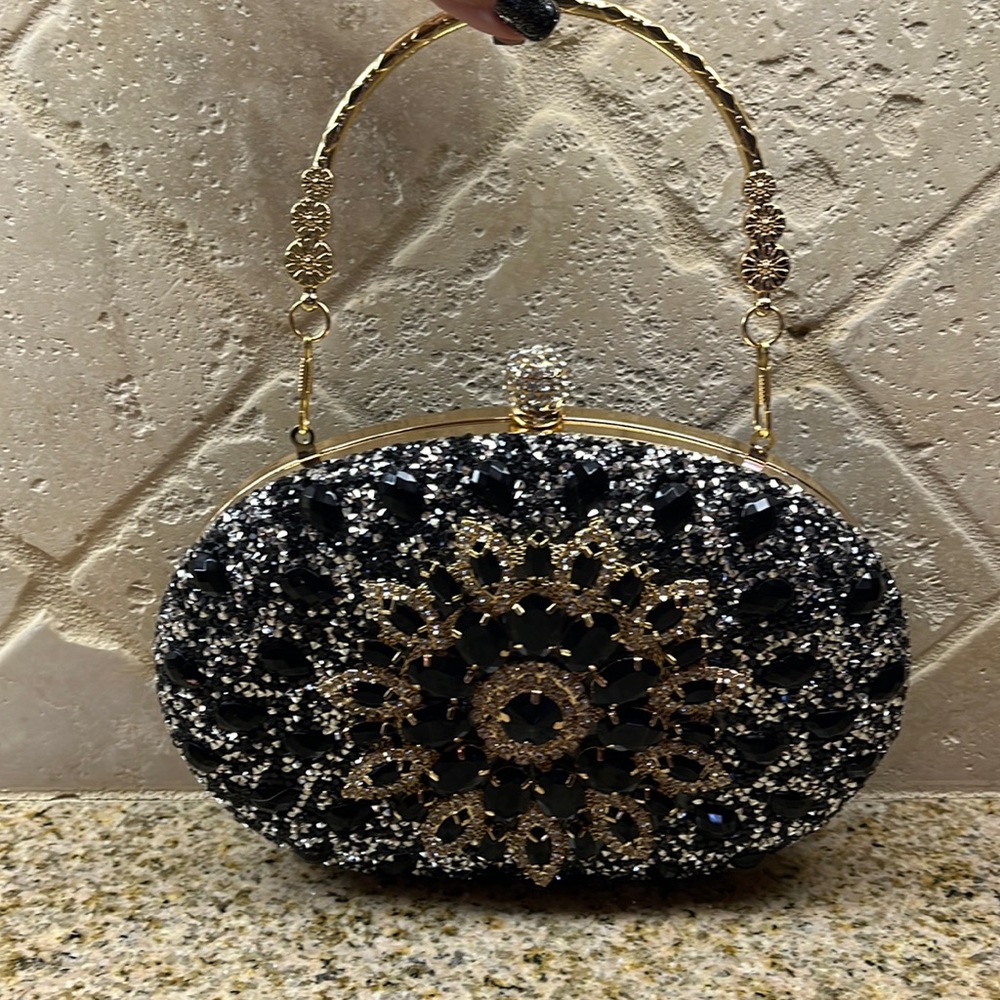 Glamorous structured evening bag. Top handle. Also 45 inch long chain. Brand new